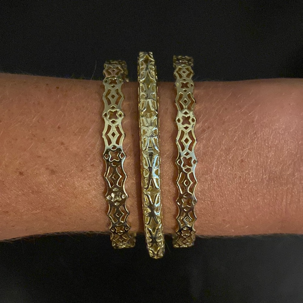 Never worn gold Kendra Scott bangles